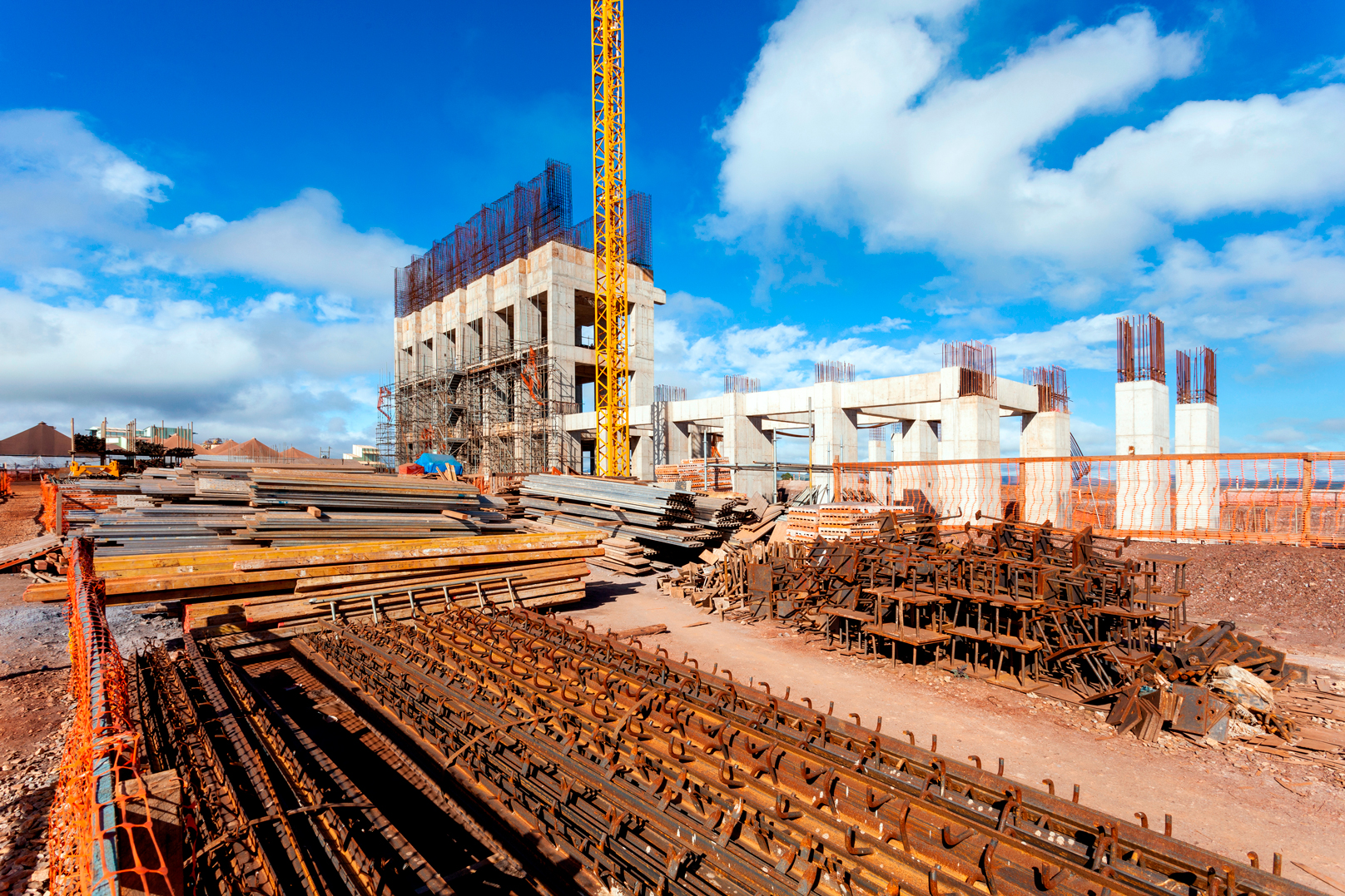 building-construction-with-crane-and-metal-reinfor-2026-03-26-11-42-57-utc