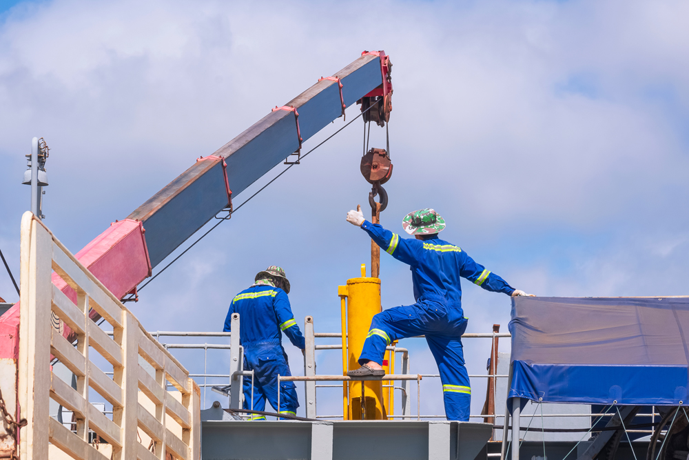 crane-workers-on-deck-under-blue-skies-2026-09-24-07-21-13-utc