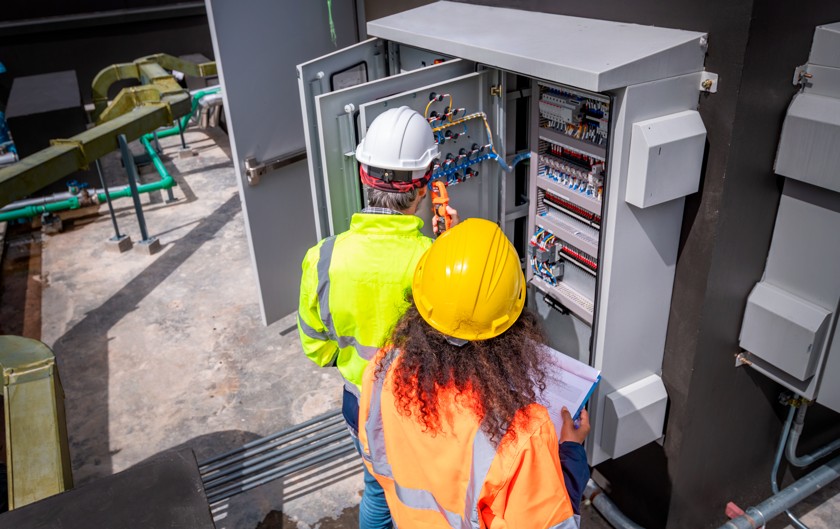 engineers-inspecting-electrical-panel-at-industria-2026-09-23-23-09-06-utc
