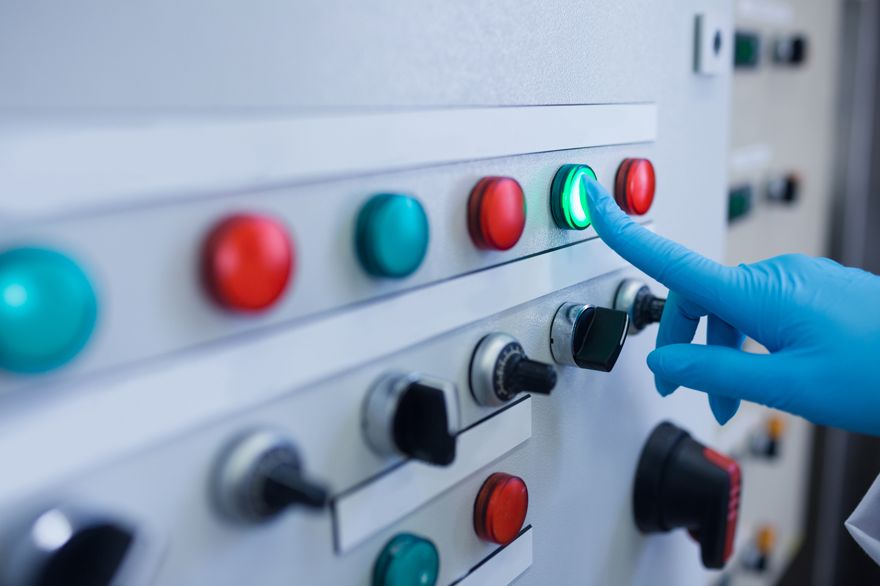 gloved-hand-activating-a-control-panel-button-2026-09-22-06-13-08-utc
