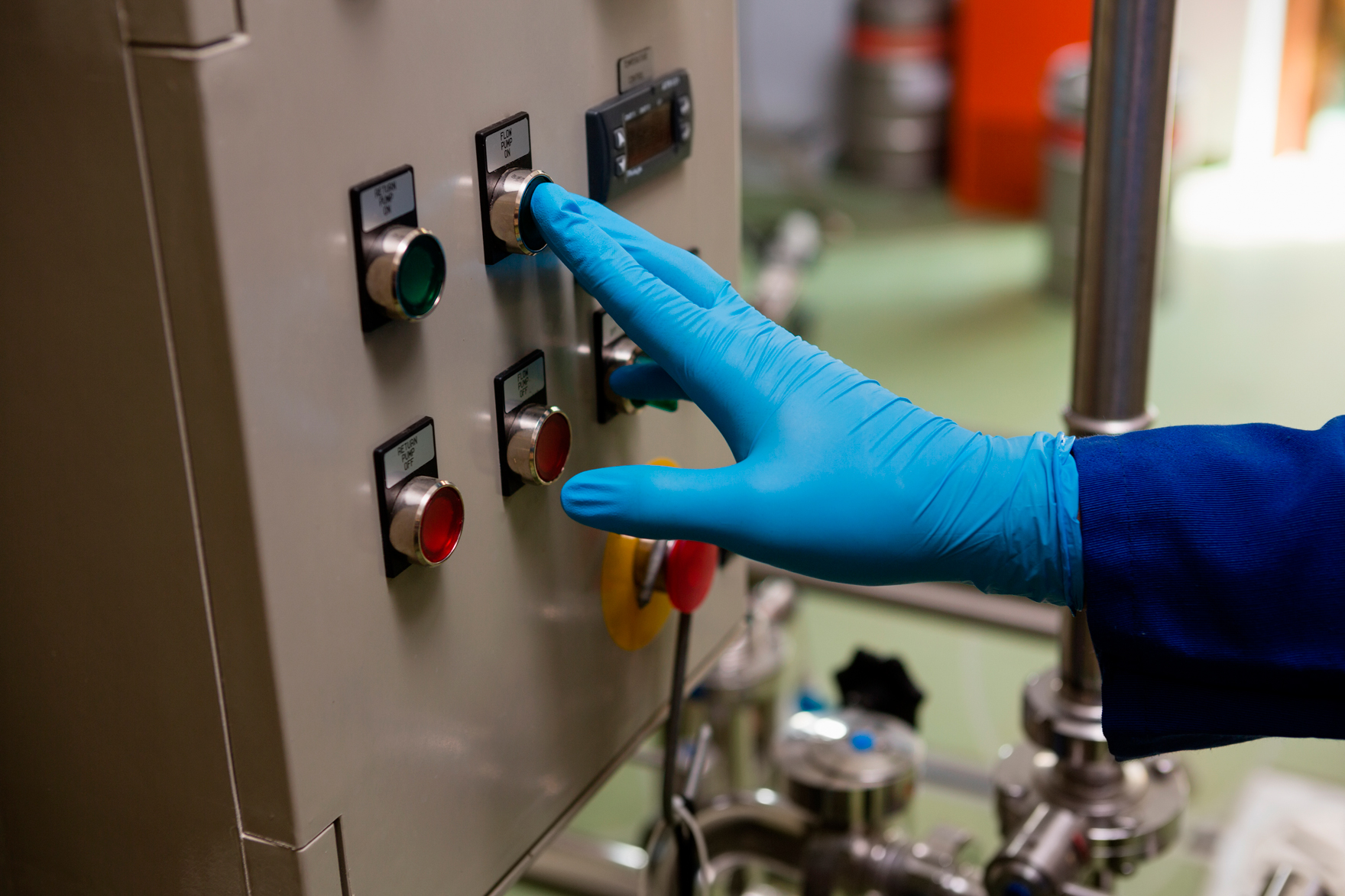 gloved-hand-operating-industrial-control-panel-2026-09-22-10-57-41-utc