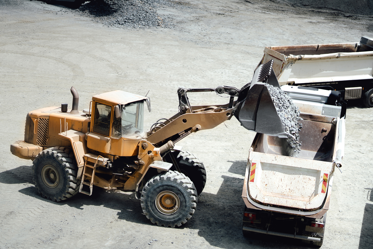 bulldozer-loading-gravel-into-a-dump-truck-2026-09-24-04-32-06-utc