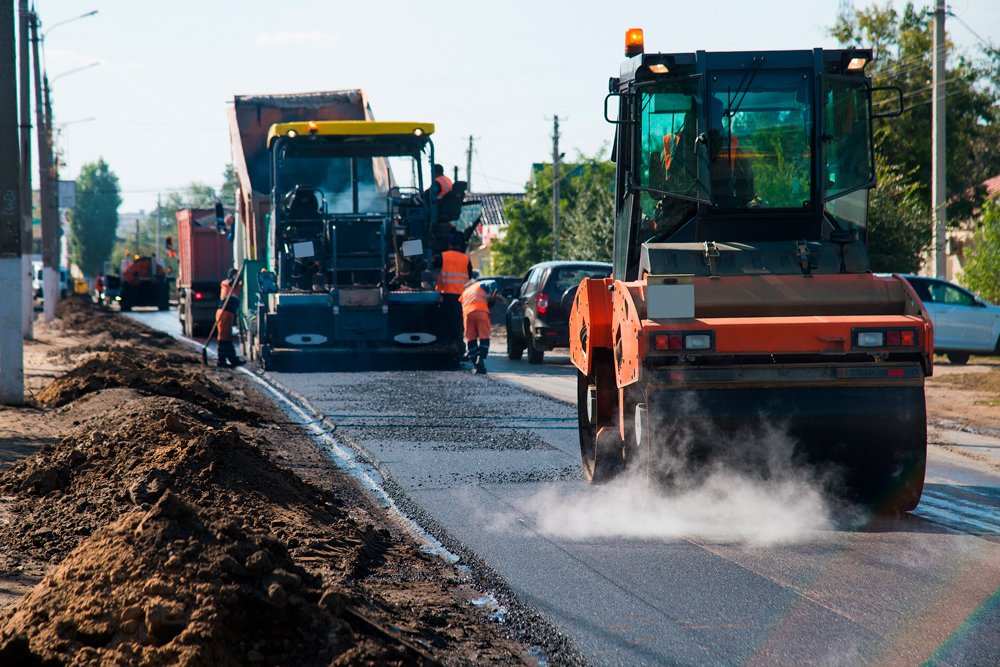 road-work-crew-paving-asphalt-surface-in-city-2026-09-24-21-54-09-utc