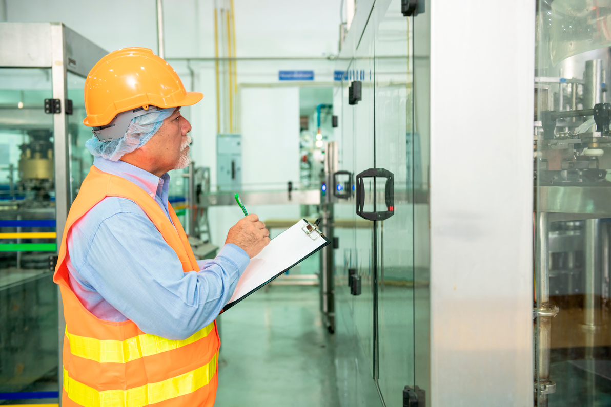 worker-inspecting-factory-equipment-for-quality-co-2026-09-24-22-55-11-utc